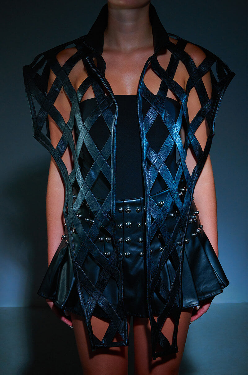 CAGED PU MOTO VEST WITH FRONT DRAPE