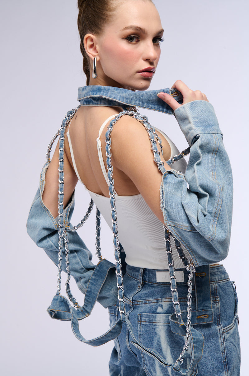 CAGED DENIM AND EXPOSED BODICE JACKET