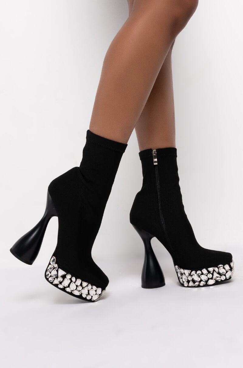 AZALEA WANG HIT RESTART CHUNKY BOOTIE IN BLACK