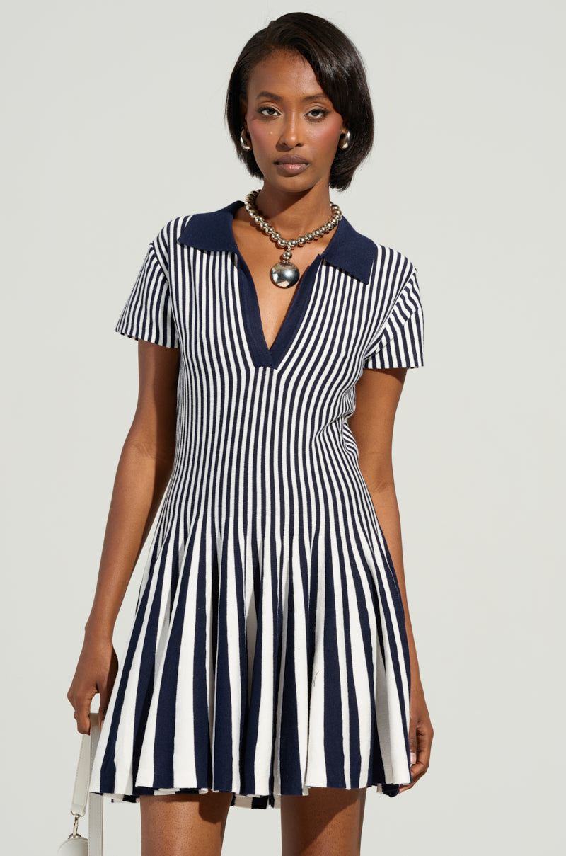 ALINA PLEATED KNIT FIT AND FLARE MINI DRESS IN NAVY