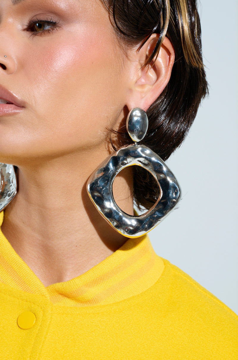 NEVER BENT STATEMENT EARRING