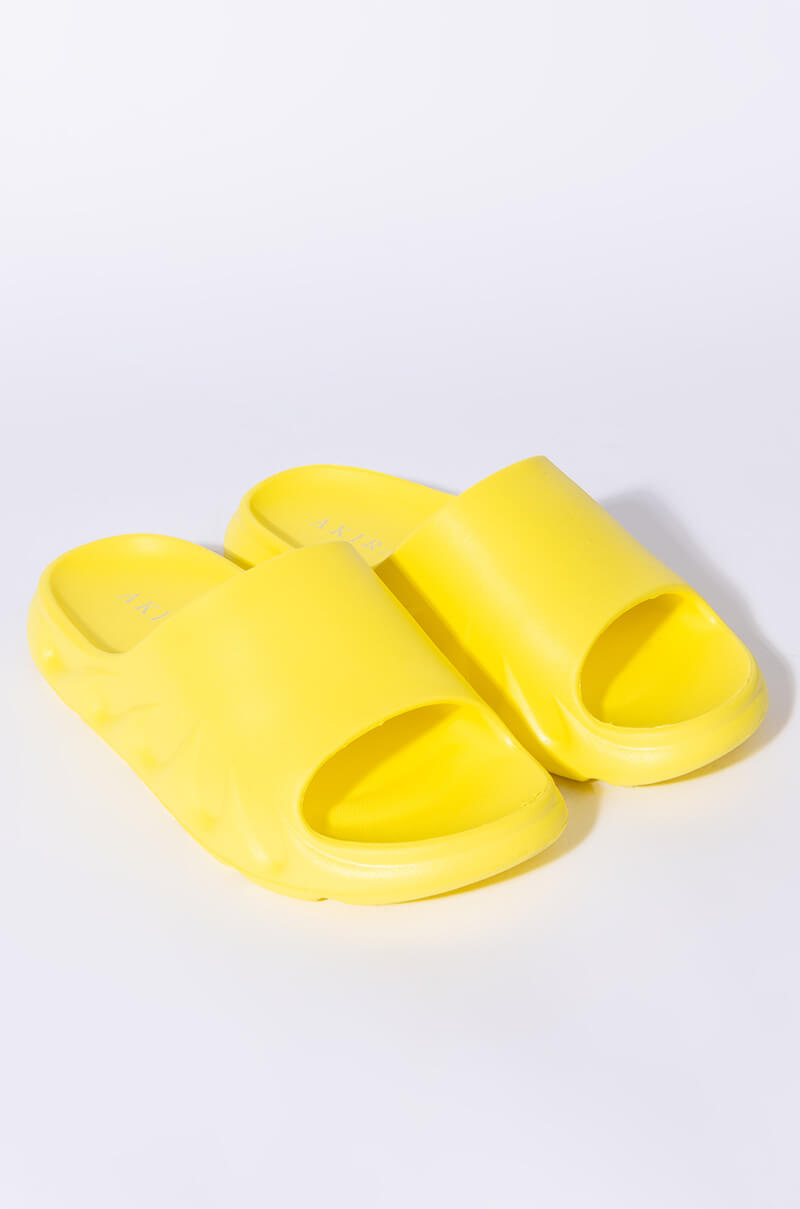 ONLY IN MY DREAMS FLAT SANDAL IN YELLOW