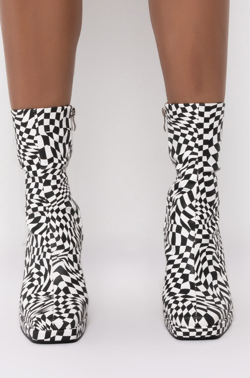 AZALEA WANG STARS TONIGHT CHUNKY BOOTIE IN BLACK WHITE
