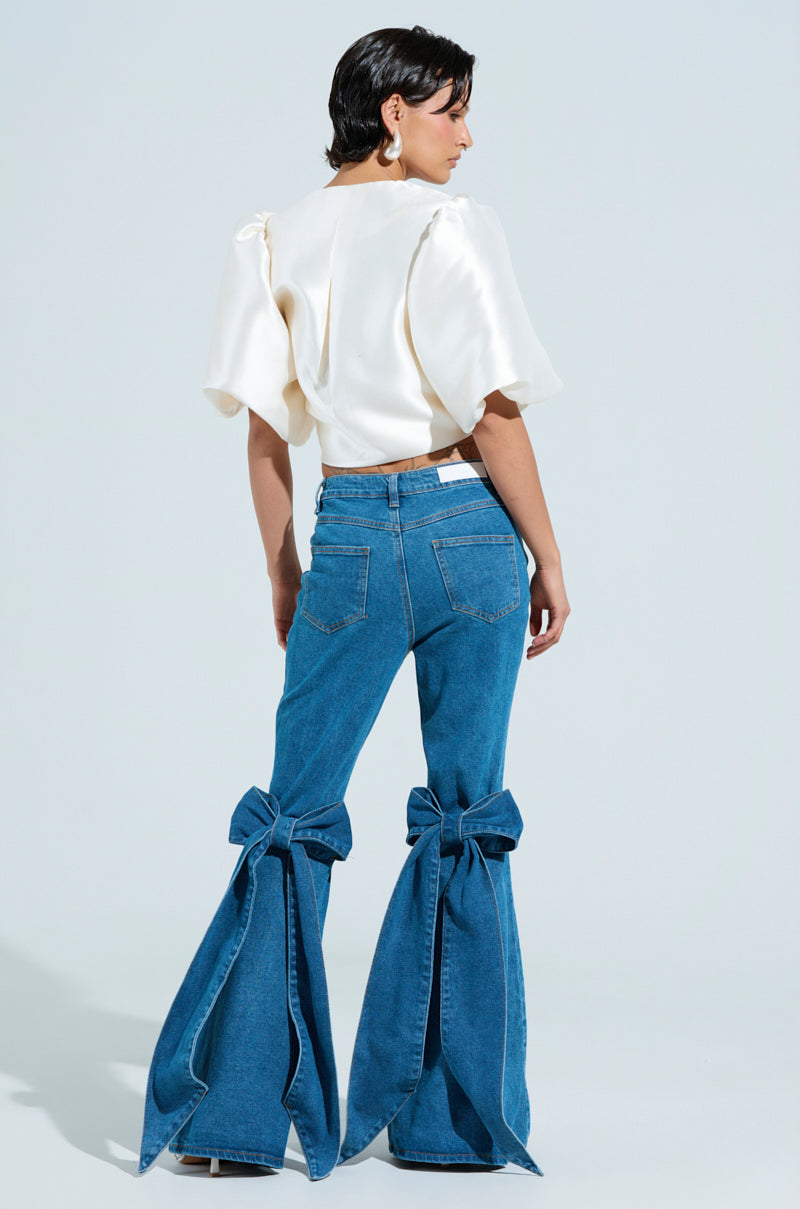 ALL TIED UP BOW FLARE JEANS