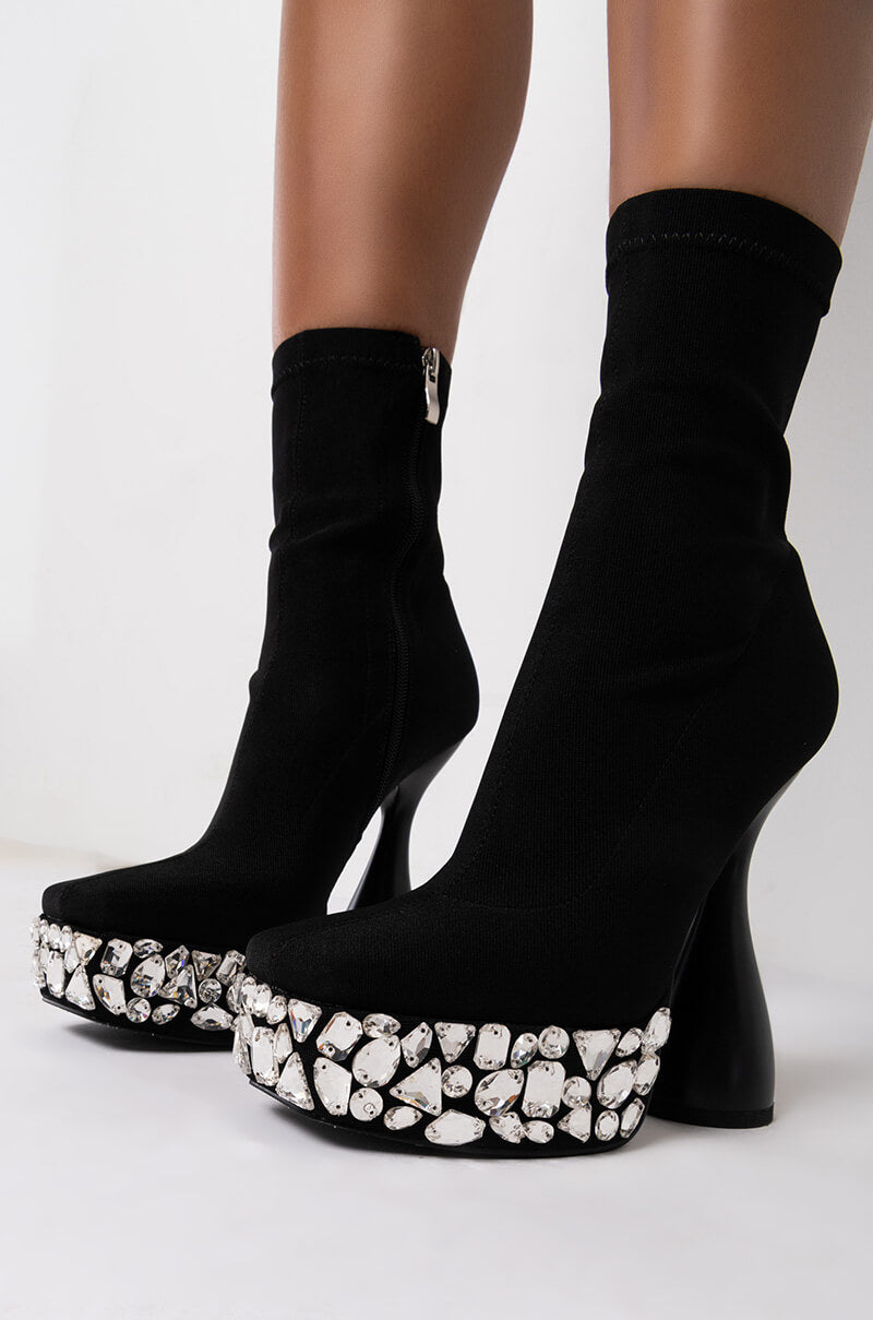 AZALEA WANG HIT RESTART CHUNKY BOOTIE IN BLACK