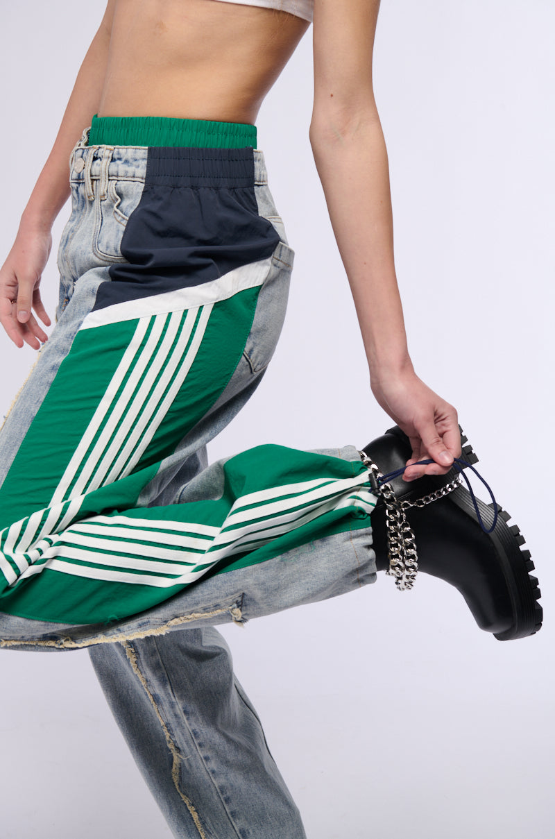 ALL AROUND THE WORLD PATCHWORK DENIM JOGGER PANT IN GREEN MULTI