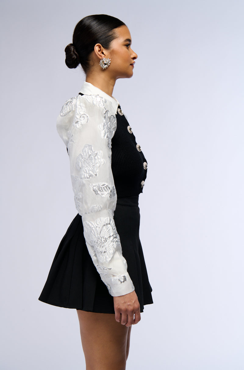 AN ELEGANT EVENING BUTTON DOWN CARDIGAN WITH BROCADE PUFF SLEEVES