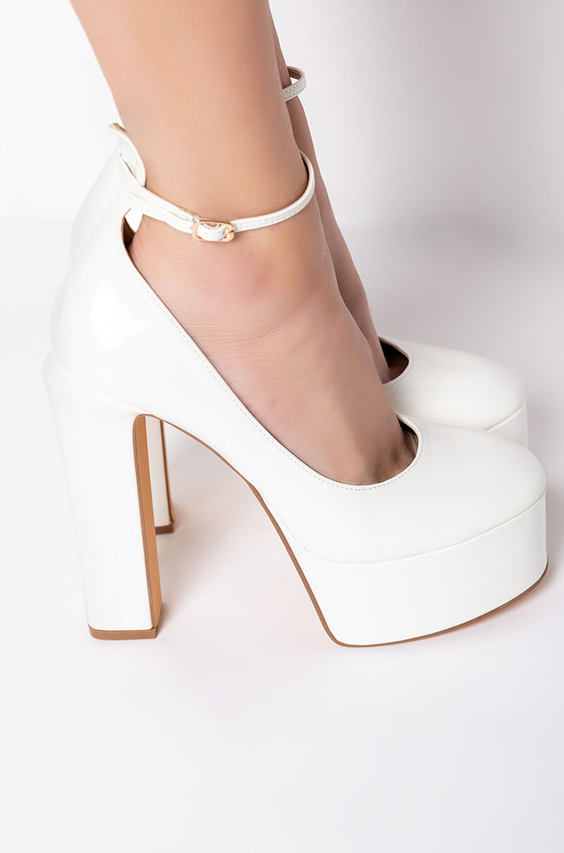 PATENT WHITE CHUNKY PUMPS