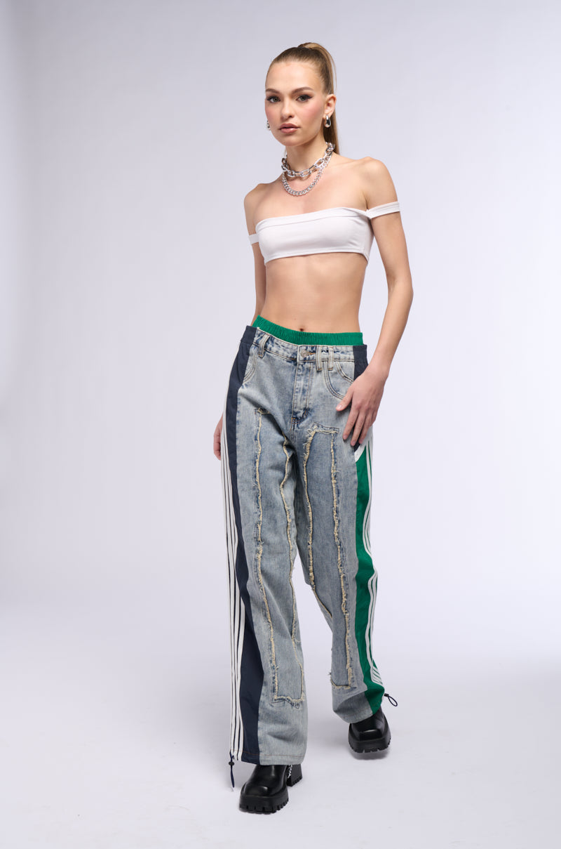 ALL AROUND THE WORLD PATCHWORK DENIM JOGGER PANT IN GREEN MULTI