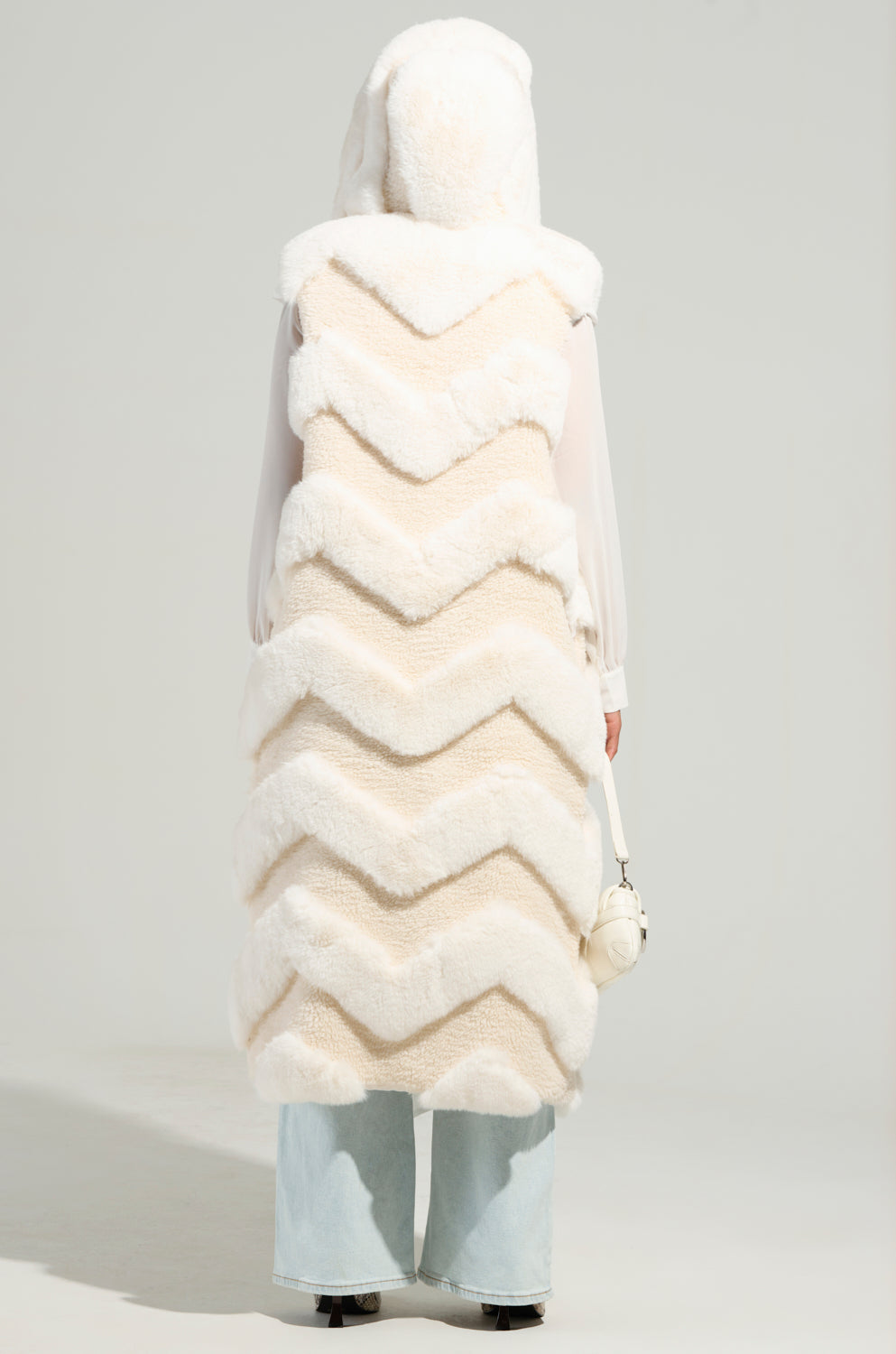 JEMI MIX MATERIAL FAUX FUR VEST IN IVORY