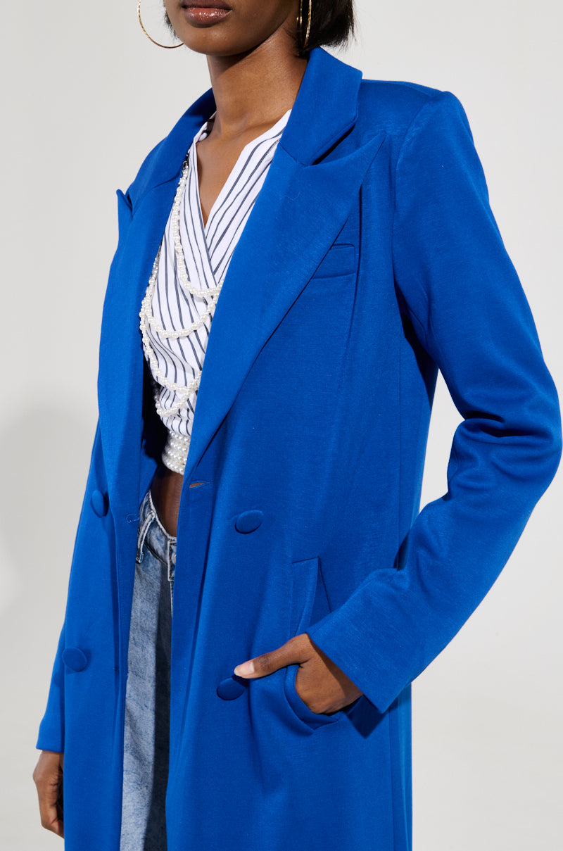 COCOA BUTTER SCUBA TRENCH IN BLUE