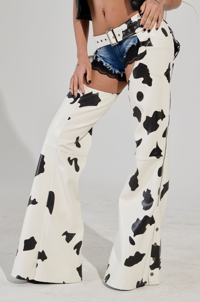 MOO OVER COW PRINT FAUX LEATHER CHAPS