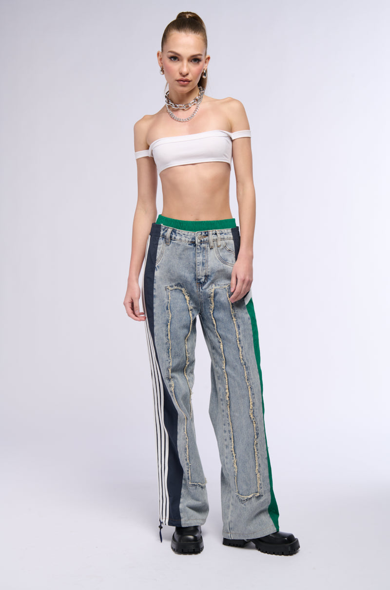 ALL AROUND THE WORLD PATCHWORK DENIM JOGGER PANT IN GREEN MULTI