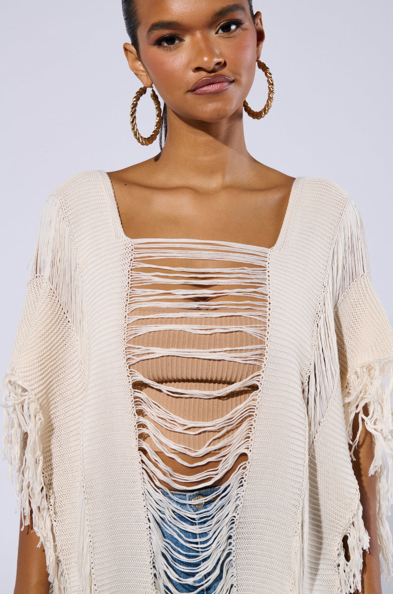 GOOD VIBES DISTRESSED PONCHO IN CREAM