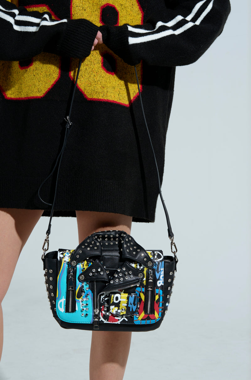 REALLY LIKE THAT PAINTED MOTO BAG