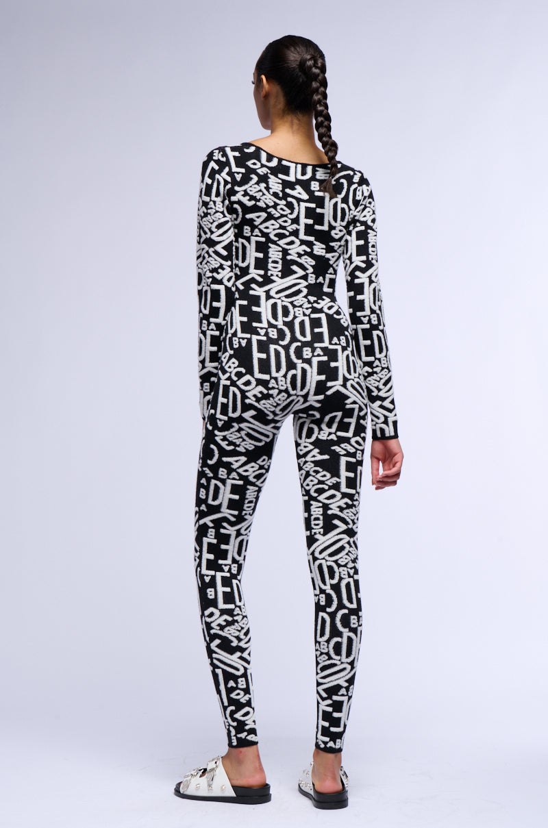 TURNING HEADS KNIT LONG SLEEVE JUMPSUIT IN BLACK