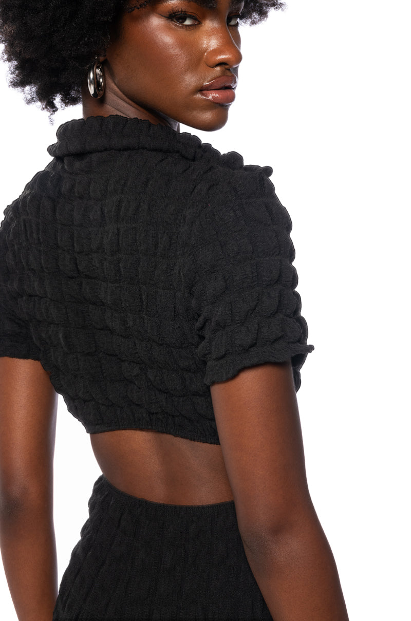 MAKE ME BELIEVE TEXTURED SHORT SLEEVE JUMPSUIT IN BLACK