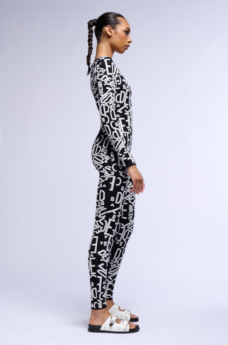 TURNING HEADS KNIT LONG SLEEVE JUMPSUIT IN BLACK