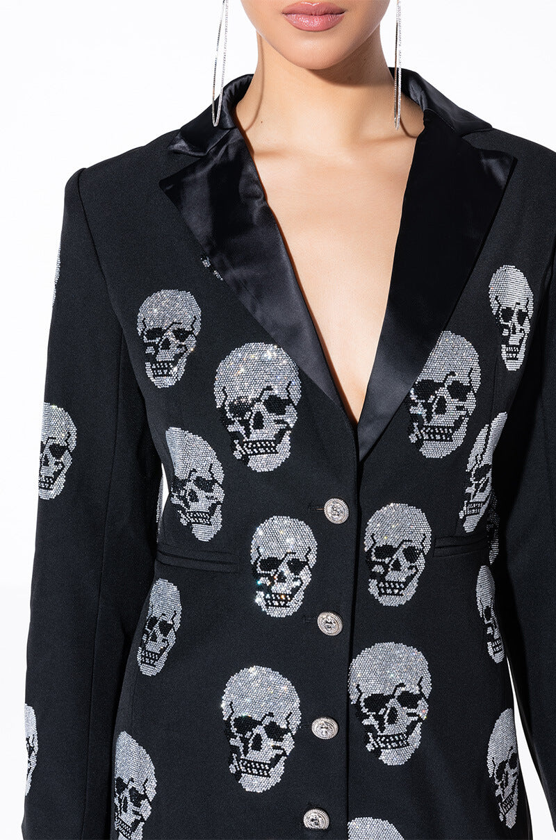 SERVING LOOKS IN THIS FASHION BLAZER WITH RHINESTONE SKULLS