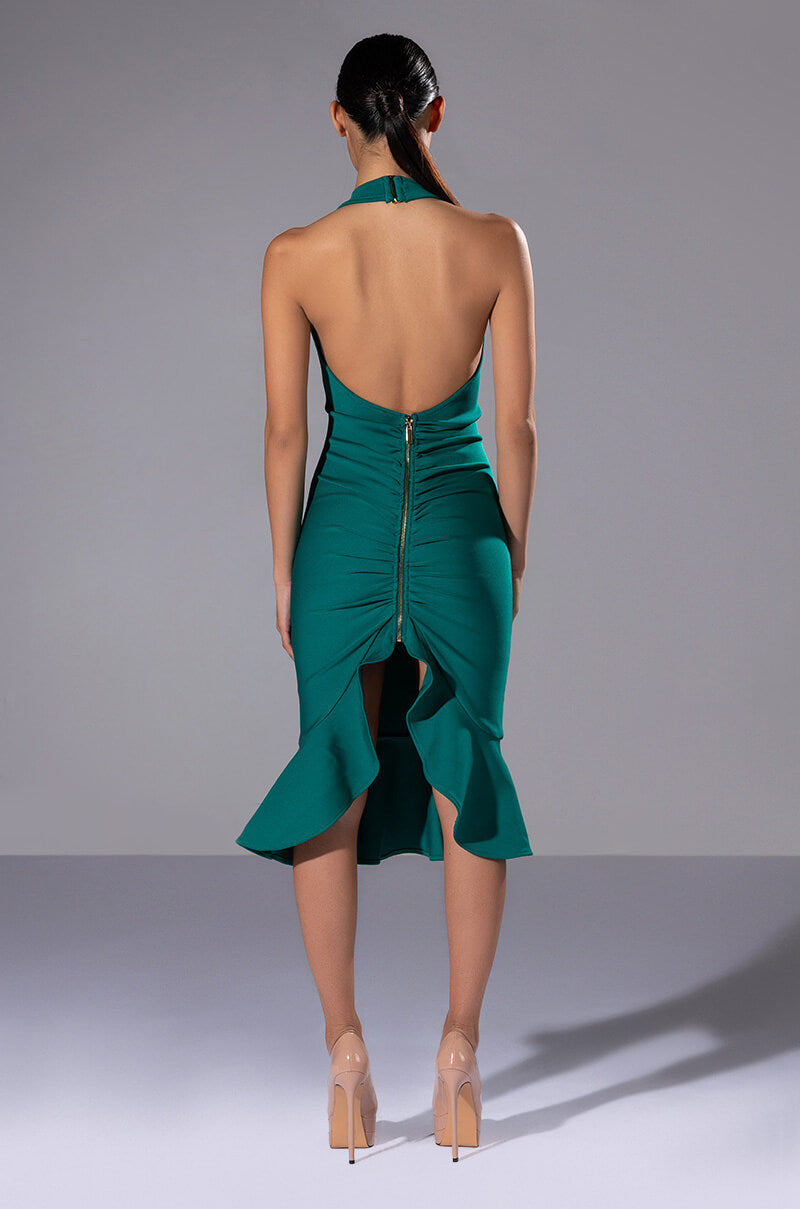 HEIRESS SLEEVELESS PEPLUM DRESS IN EMERALD