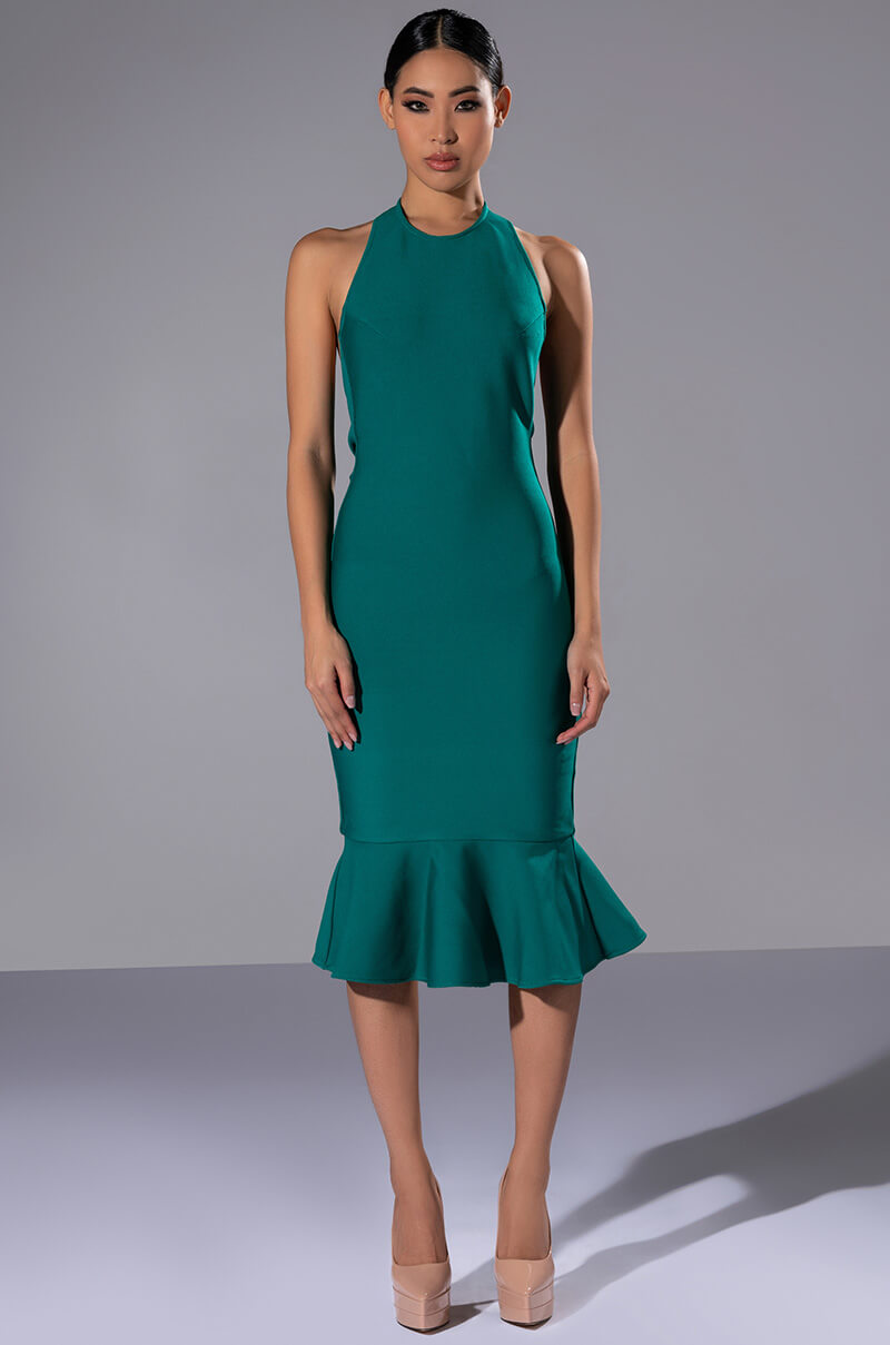 HEIRESS SLEEVELESS PEPLUM DRESS IN EMERALD